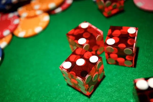 Live dealer studio with professional croupier managing Gem Saviour table